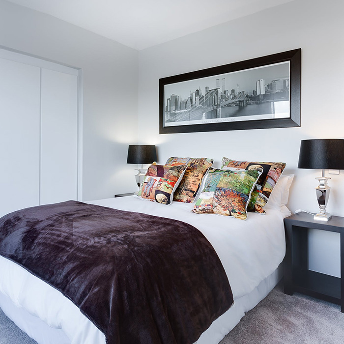 White Upholstered Rectangular Bed