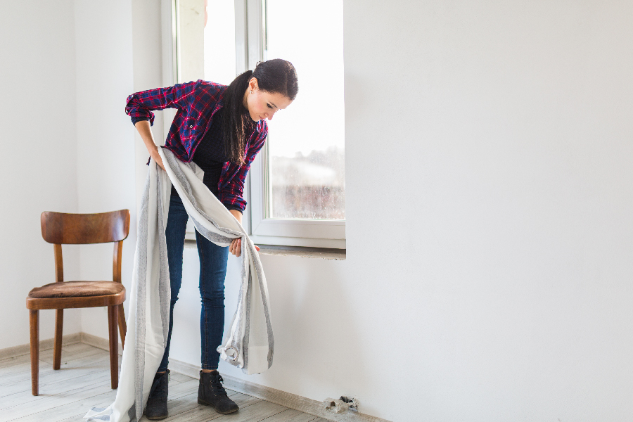 Removing of heavy window coverings and cleaning dust mites