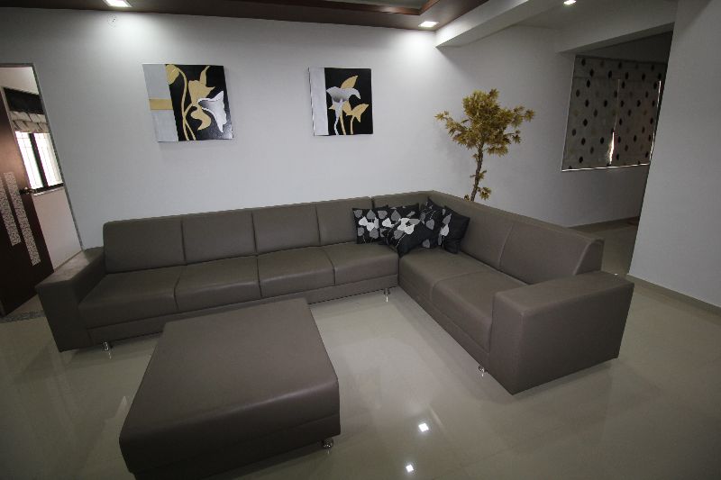 L - Shaped Equi-Length Sofa Placed in a White-Themed Modern Living Room