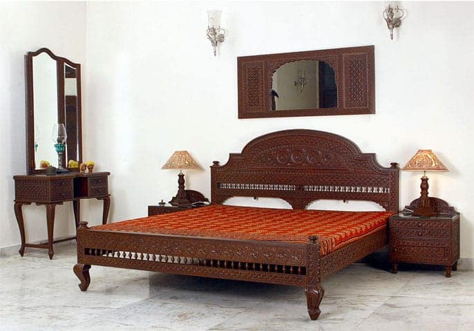 White Bedroom with Carved Furniture: A Serene and Elegant Space