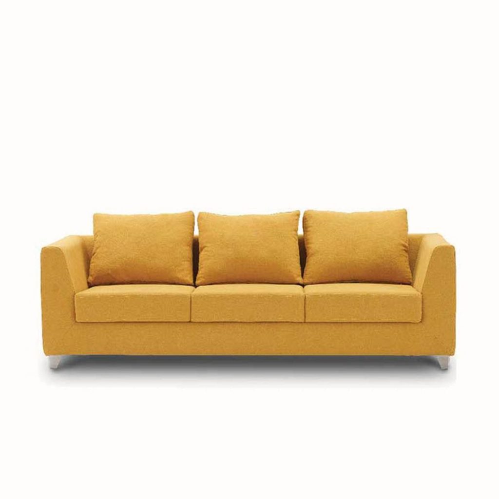 Yellow Sofa Rectilinear with Three Cushions Arranged on The Sofa