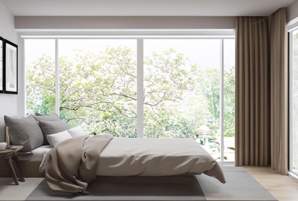 Bed in Front of a Window