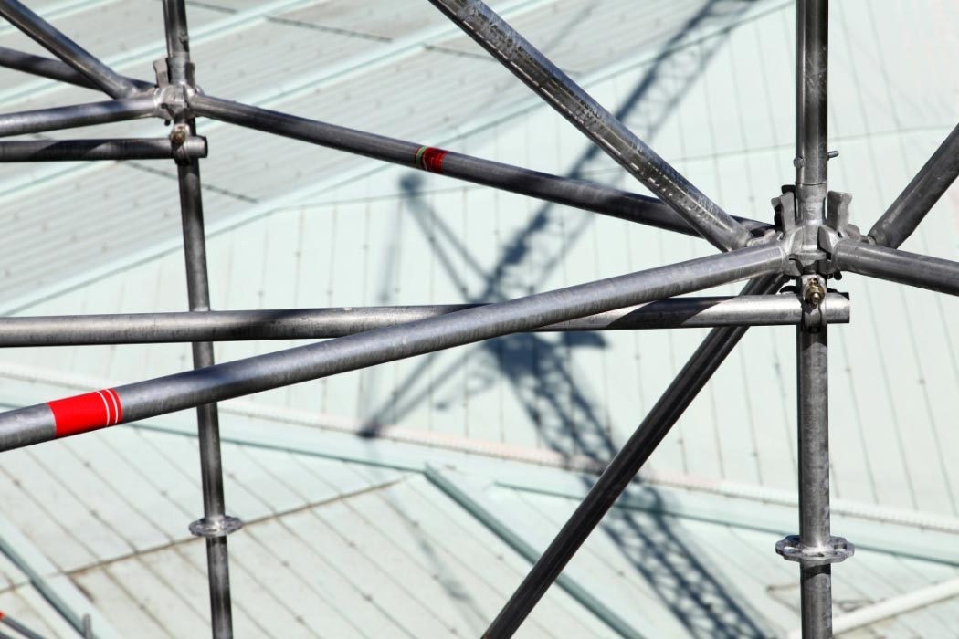 Tying the Scaffold to the Building