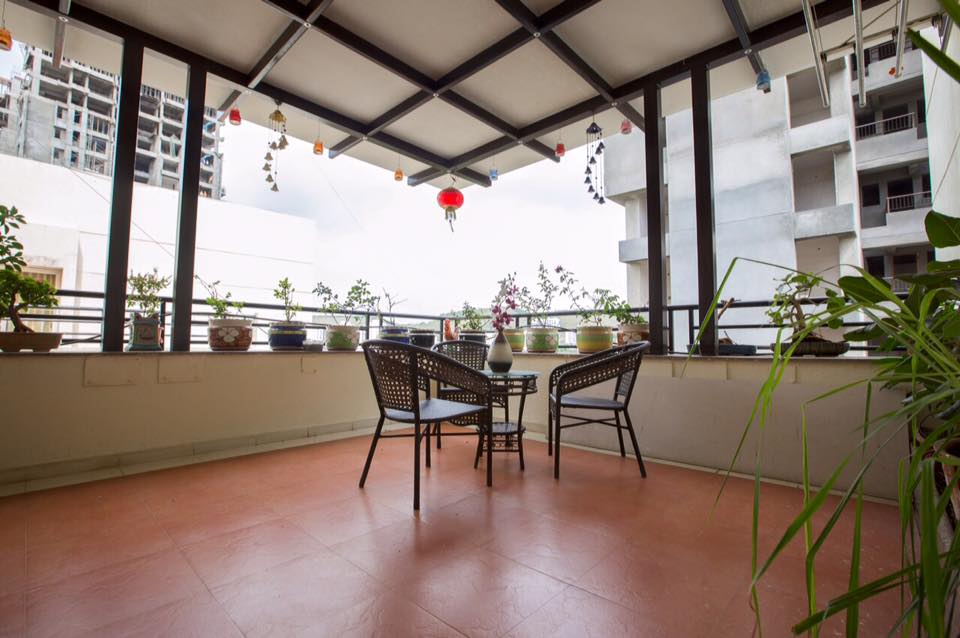 Beautifully Designed Balcony with an Open yet Cosy Ambiance