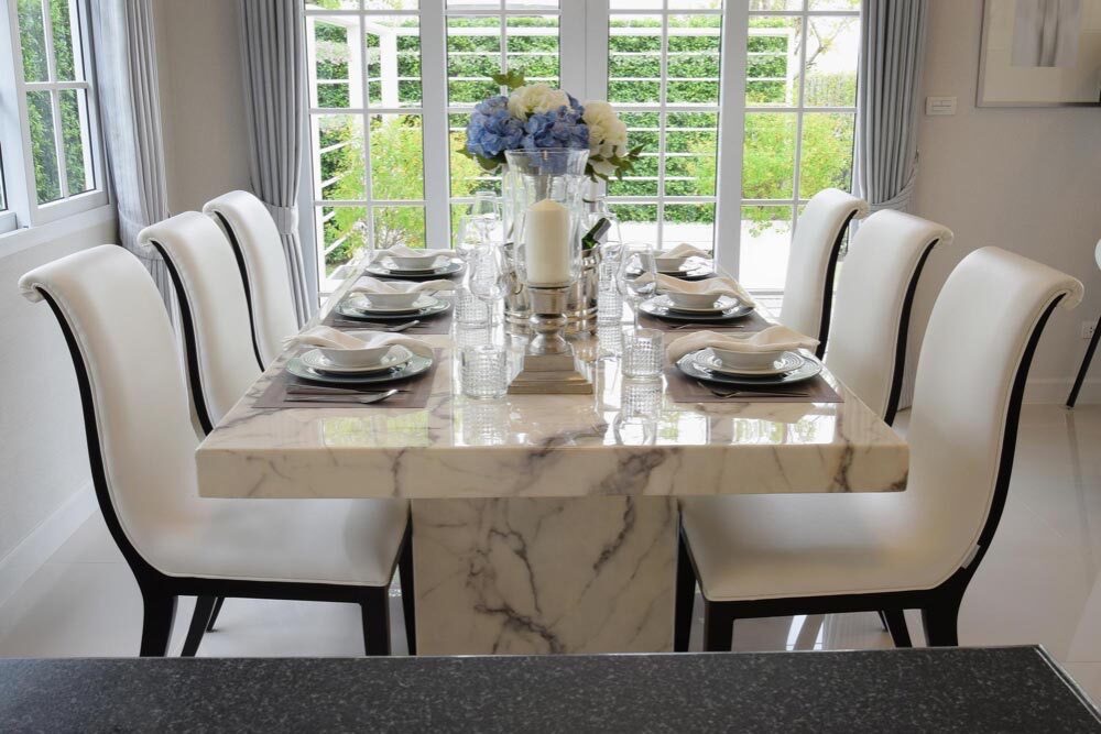 Selecting Dining Chairs That Balance Style and Comfort around Marble Dining Table