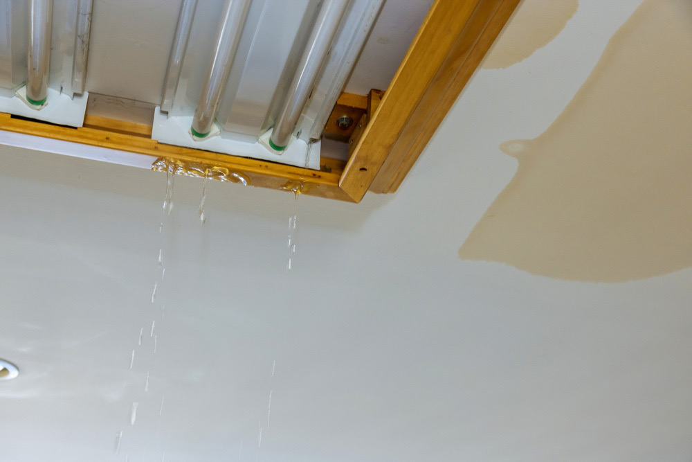Steps to Mitigate Commercial Roof Leak Damage Steps to Mitigate Commercial Roof Leak Damage