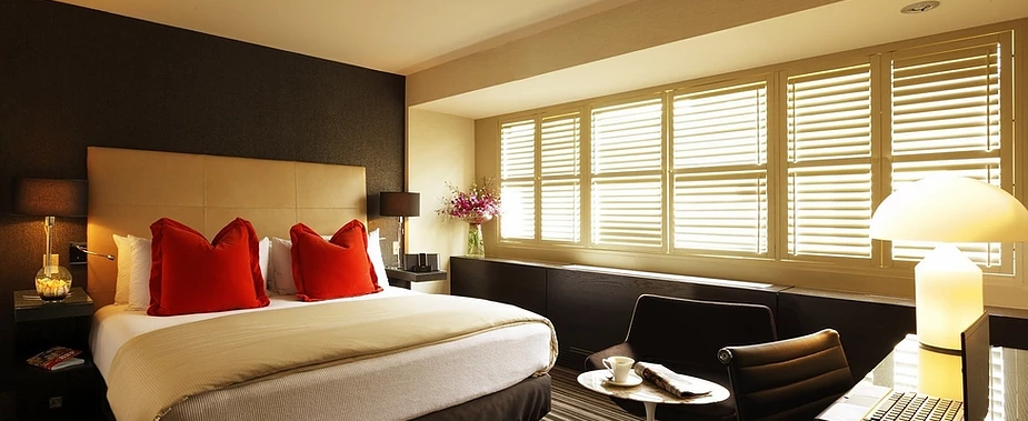 Eaturing a Plush Double Bed Adorned
