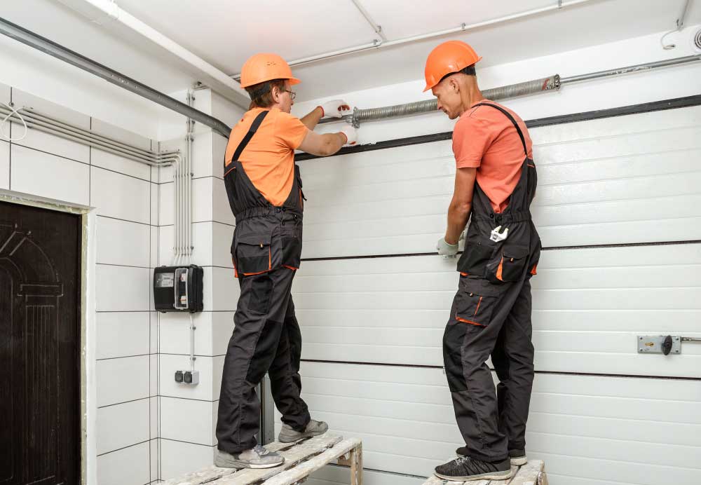 Professionals Repairing Garage Door