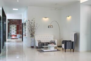 Bright Modern Indoor Seating with a White Tufted Two-Seater Sofa