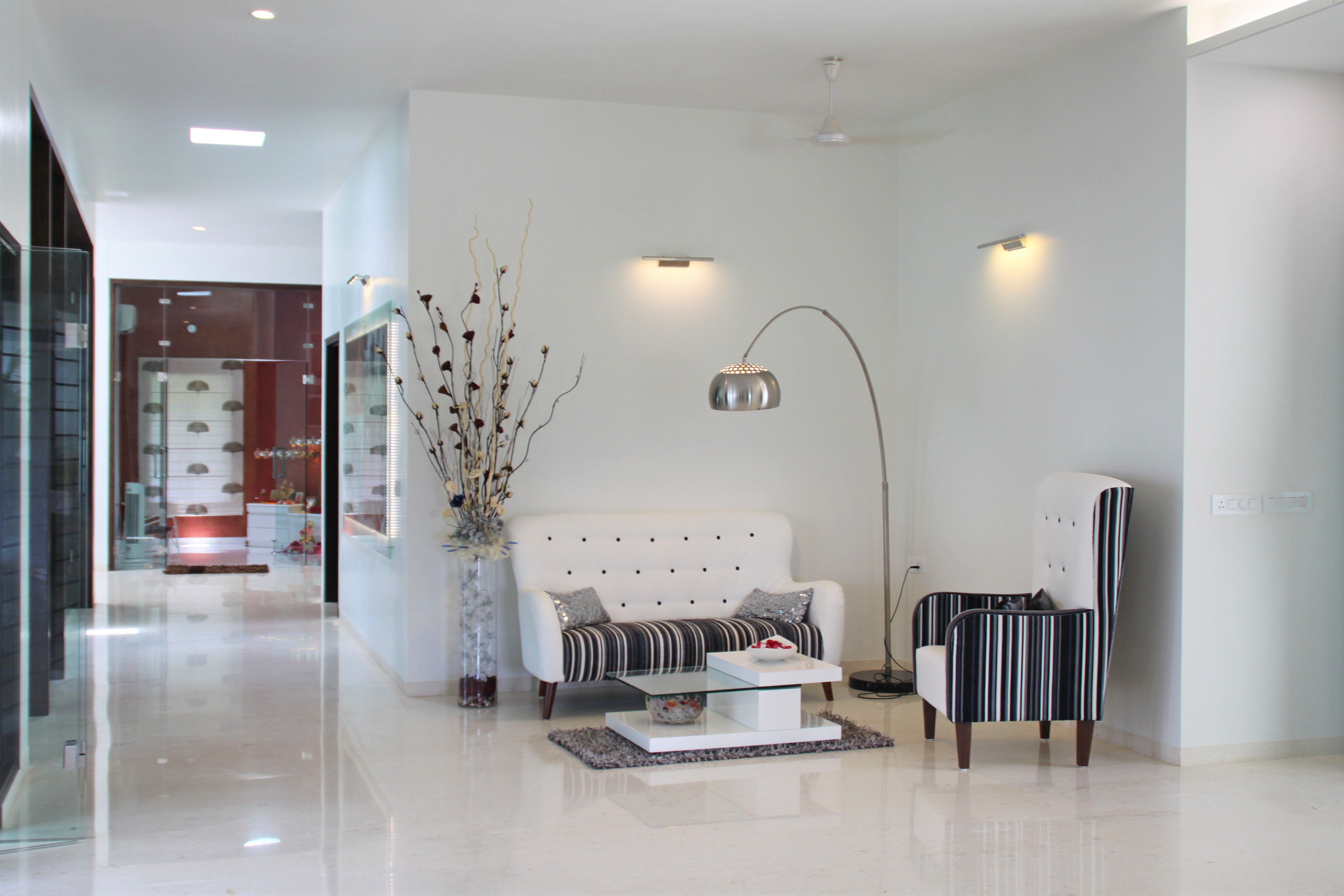 Bright Modern Indoor Seating with a White Tufted Two-Seater Sofa