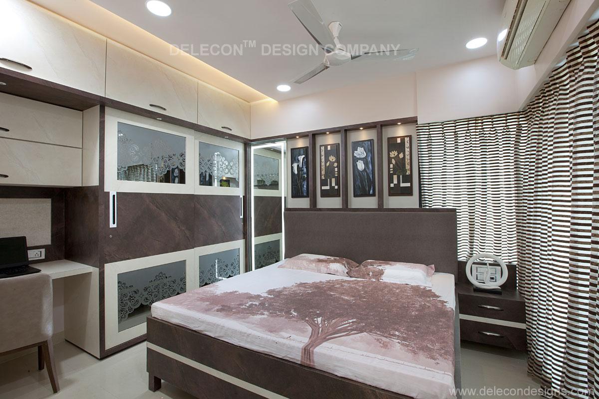 Modern bedroom design with dark brown and white cabinets