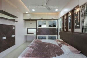 Modern bedroom design with dark brown and white cabinets