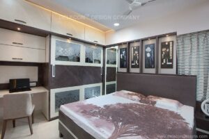 Modern bedroom design with dark brown and white cabinets