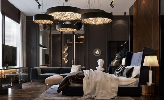 Luxury bedroom with statement chandeliers and dark textured walls