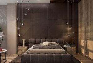Modern calming bedroom with warm wood tones and plush grey headboard